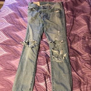 Men’s distressed jeans.